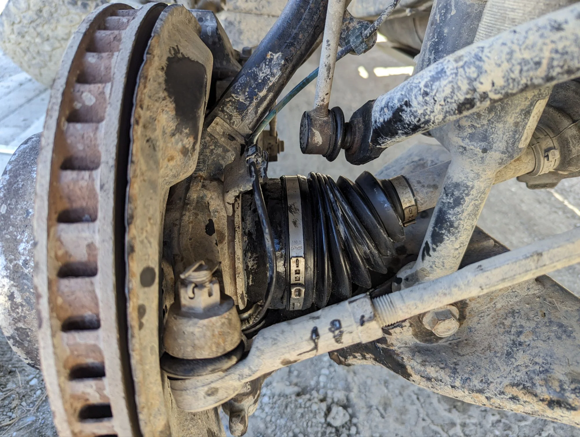 We did not manage to locate the origin of the squeaking noise but found a part of the front wheel suspension that got loose and we fixed that.