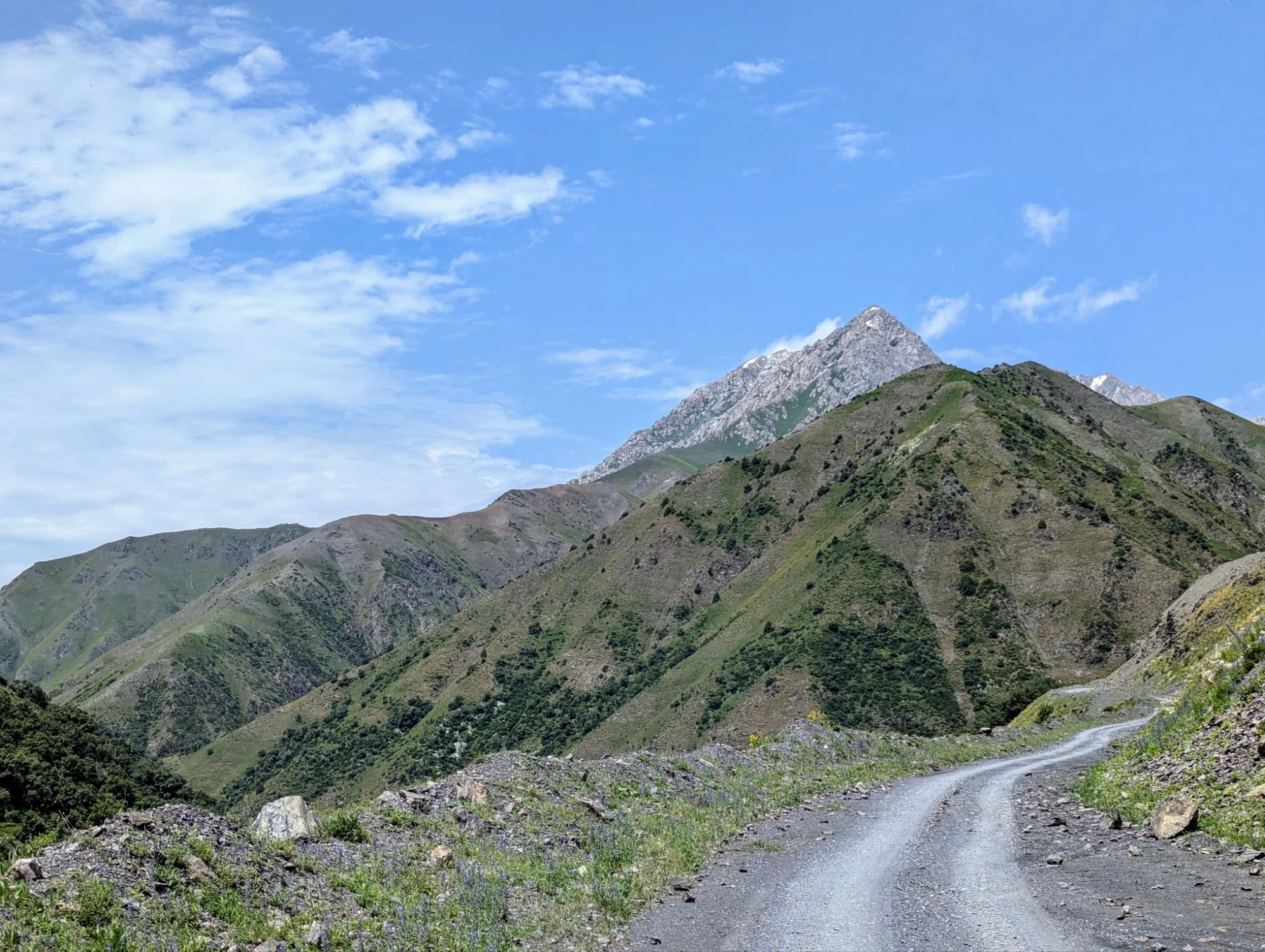We passed the border from Uzbekistan to Kyrgyzstan near Osh and entered the beautiful Kyrgyz mountains.