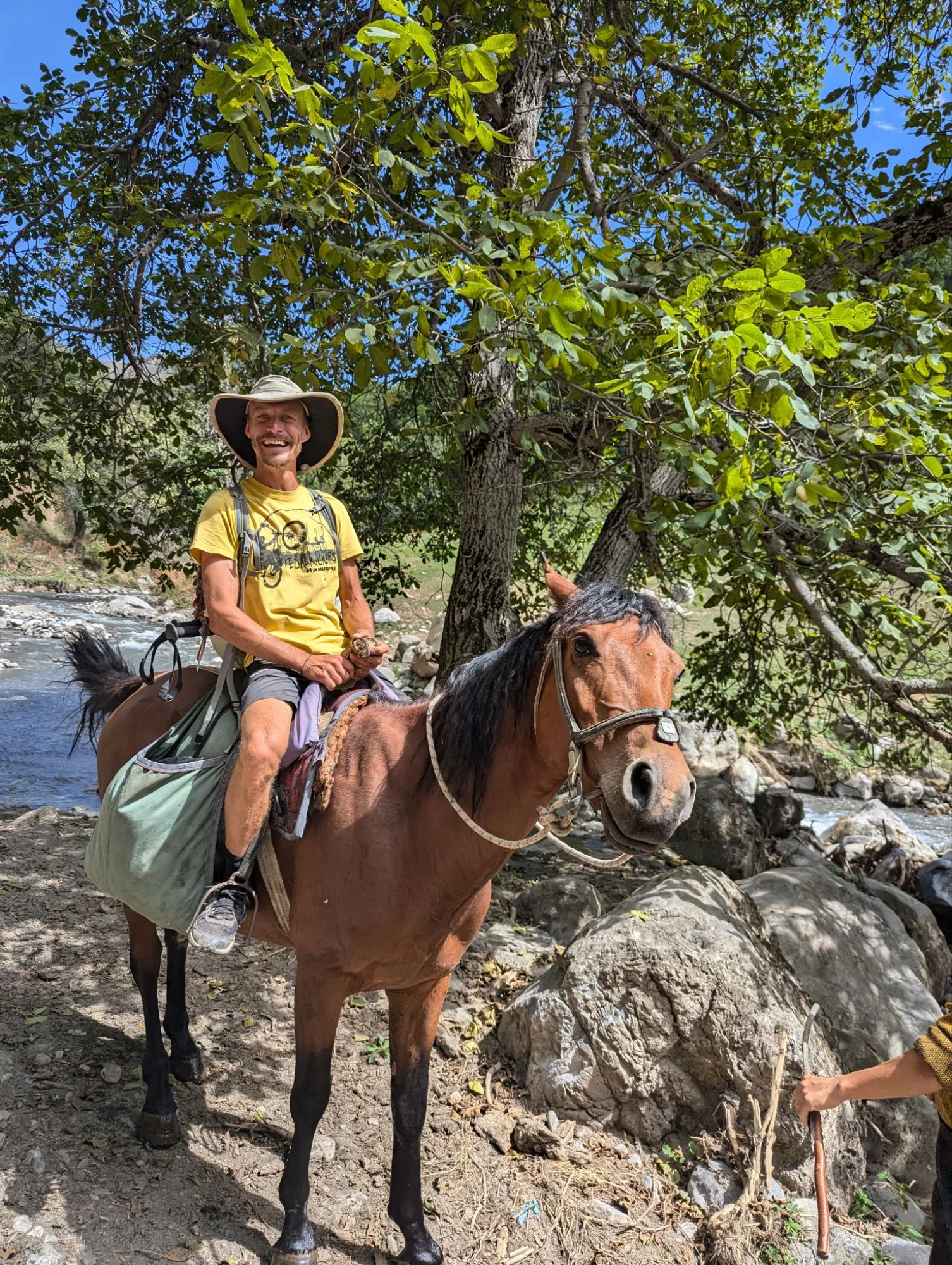 When I was about to take off my shoes for a river crossing, a nice local came with his horse and brought me across the river.
