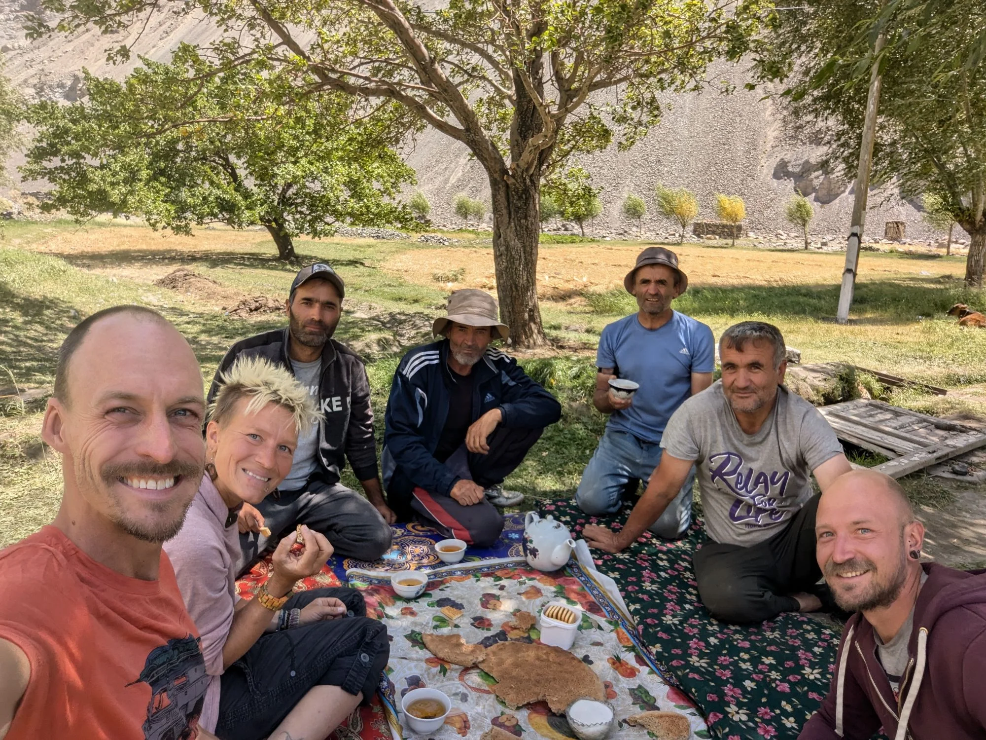 In one oasis village we met a group of super friendly villagers. One of them spoke very good English and invited us to spend some time with them.  It was very interesting. We talked a lot about their lives in that remote village and about life in Tajikistan in general.