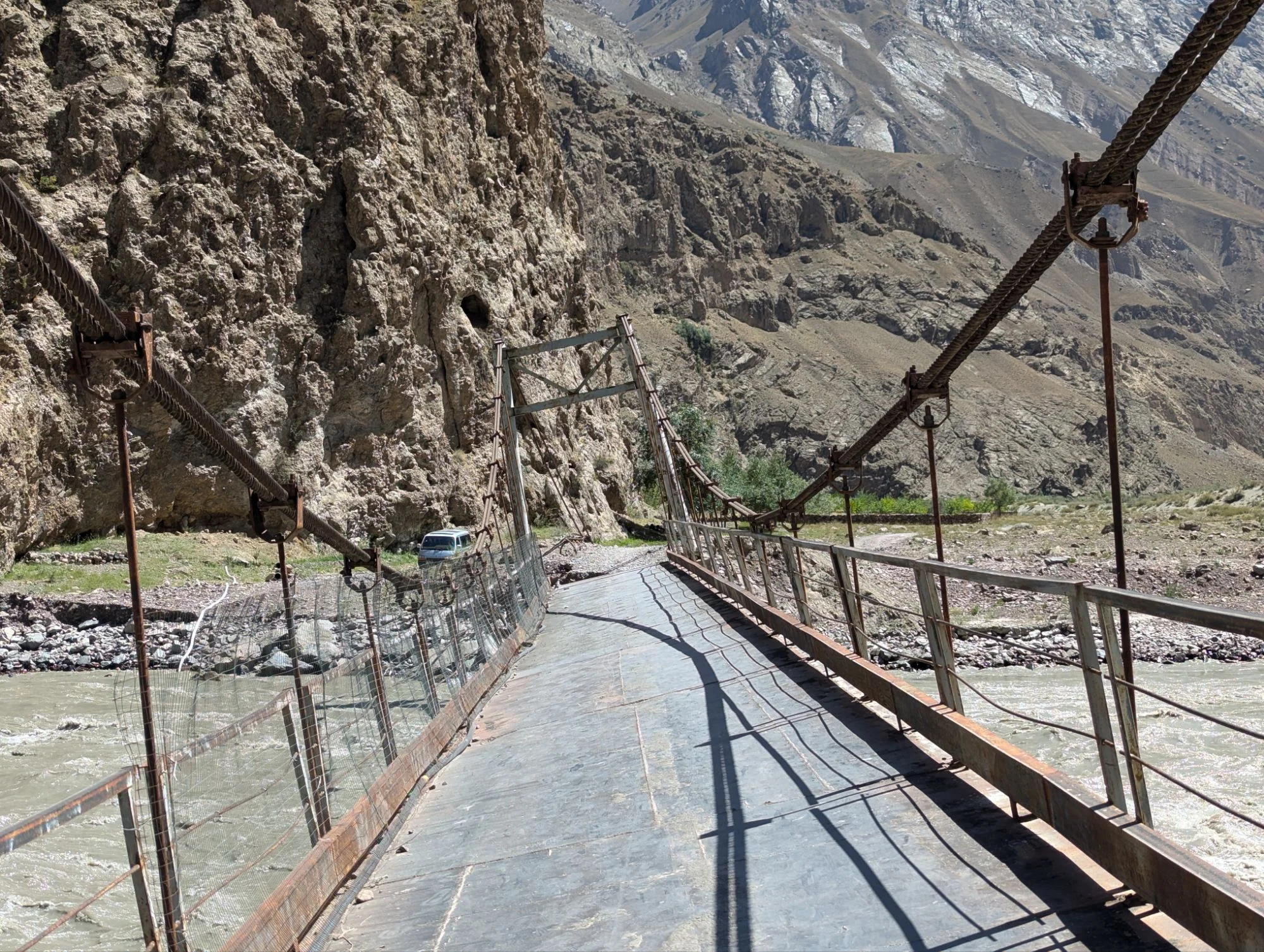 Our visitor got a seat in Otto and together we continued our journey through the valley which became more easy to drive and at some point we got back on a real dirt road. This bridge looked adventurous but we did not have to cross it.