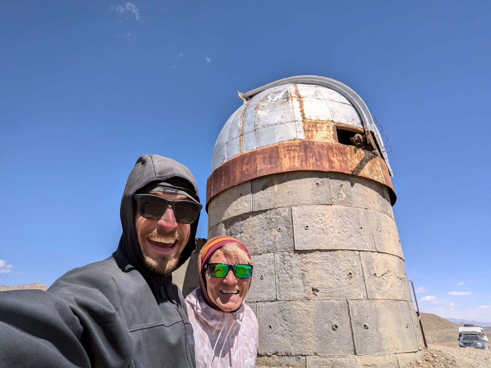 And a absolutely stormy old observatory. The wind was so strong that we could lean into it. But staying there with Rosinante was not an option and so we went down from the hill to a river.
