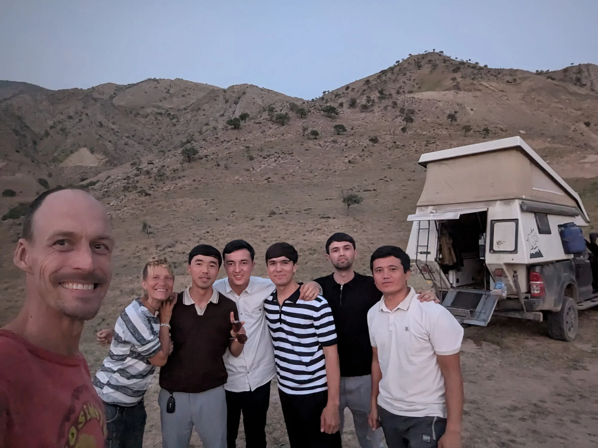 The reservoir was a famous attraction for the locals and a lot of people came by and had a chat with us. Especially with a group of young Uzbek guys we spent a bit more time talking about differences in German and Uzbek lives, cultures etc. Some of them could speak fair English and indeed they were English teachers and so the communication was more fun than work. As always they could not believe that Racki and I were not married and had no kids. Especially the kids topic was almost disturbing to them. We described how a romantic teenager Young adult love life may be in Germany and they were astonished. After some days we met one of the guys at his place. We talked more and his mother and sisters did our laundry. We wanted to do it on our own but this was not possible and at some point it felt insulting not to let them do it