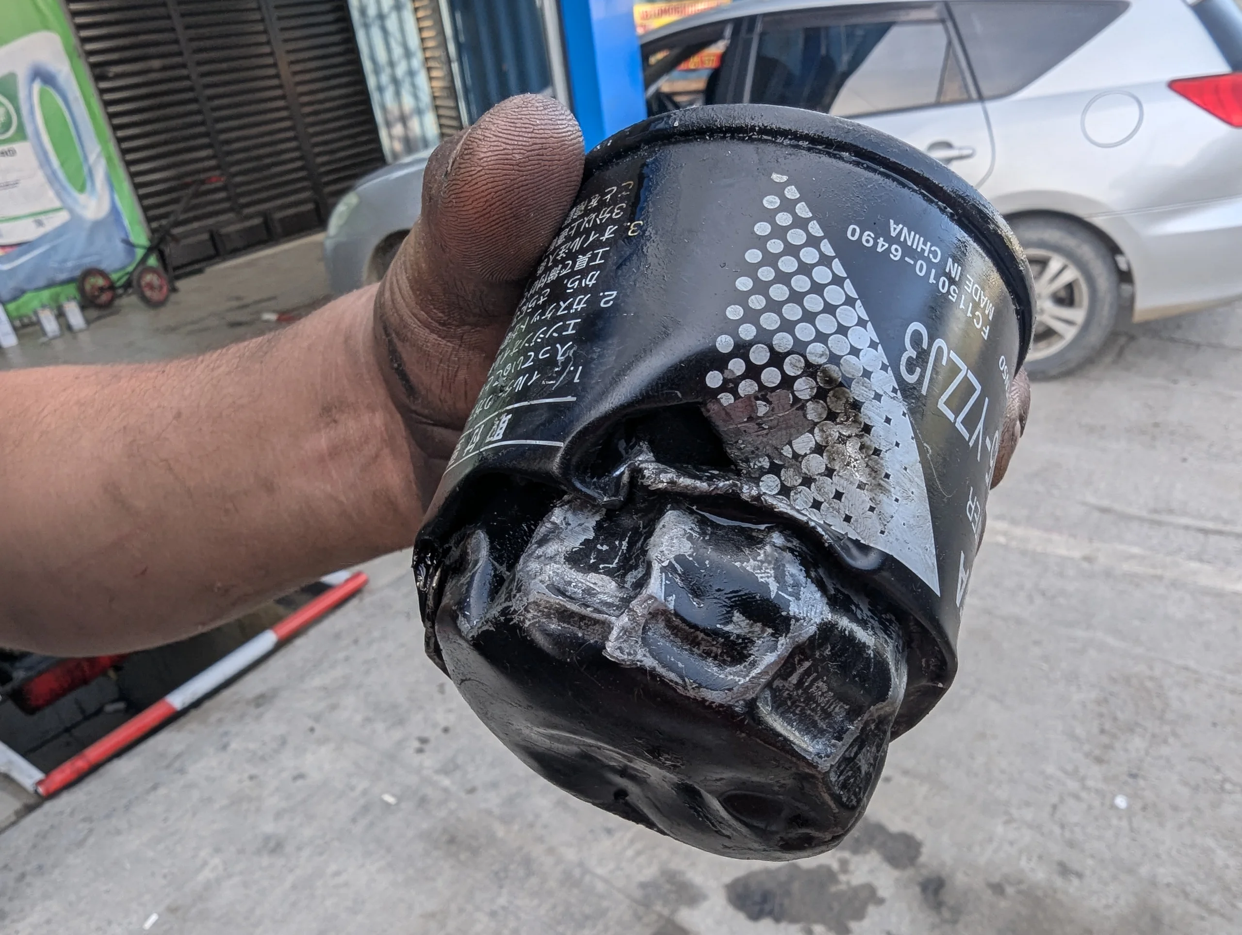 When I checked the new bushings and we investigated a noise Rosinante made only from now and then, we found oil leaking out of her engine 😯 In the end we found that the noise came from Rosinante&rsquo;s bottom protection and the oil came out of the oil filter. We went to Karakol to have the filter changed and the mechanic needed almost an hour to remove the old one because the last mechanics had put it so strong on the engine 🤪