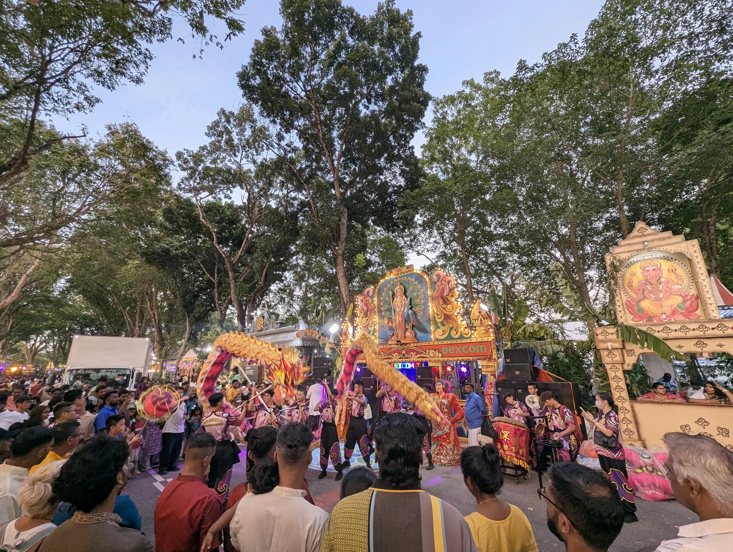 And then we reached the area of the main activities! It was crazy! People carrying dragons, dancing, praying, super loud modernized, electronic, Indian chanting-style music, &mldr;
