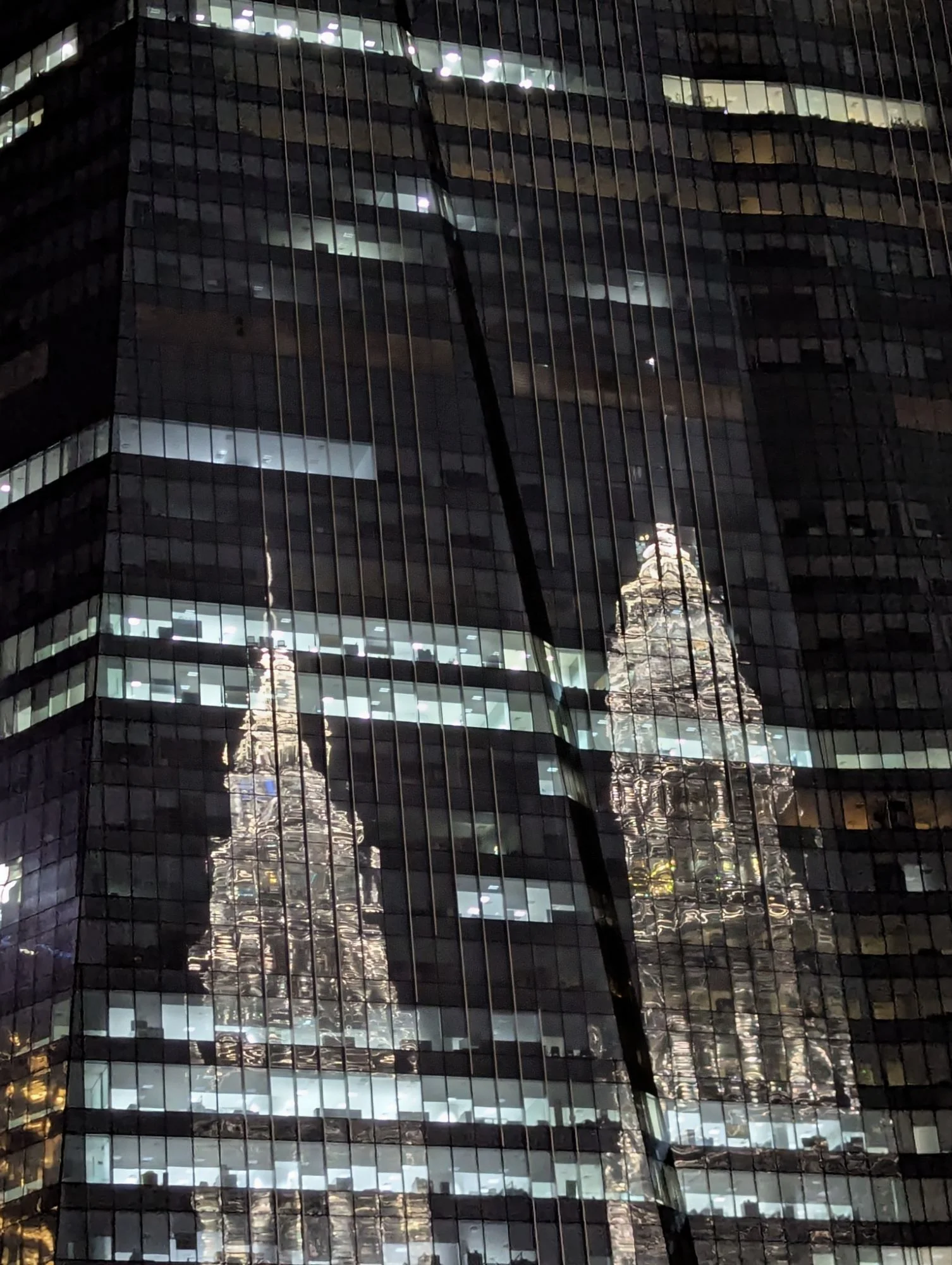 The famous PETRONAS Twin Towers as a nice reflection.