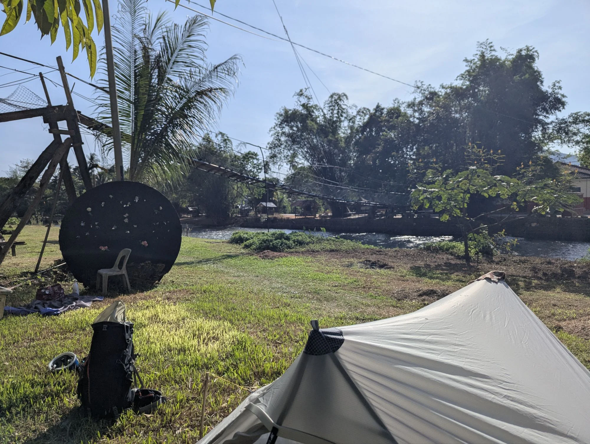 The bridge connecting both sides of the river was broken but the locals already started repairing it. Crossing the river by foot was possible through the waist deep water.