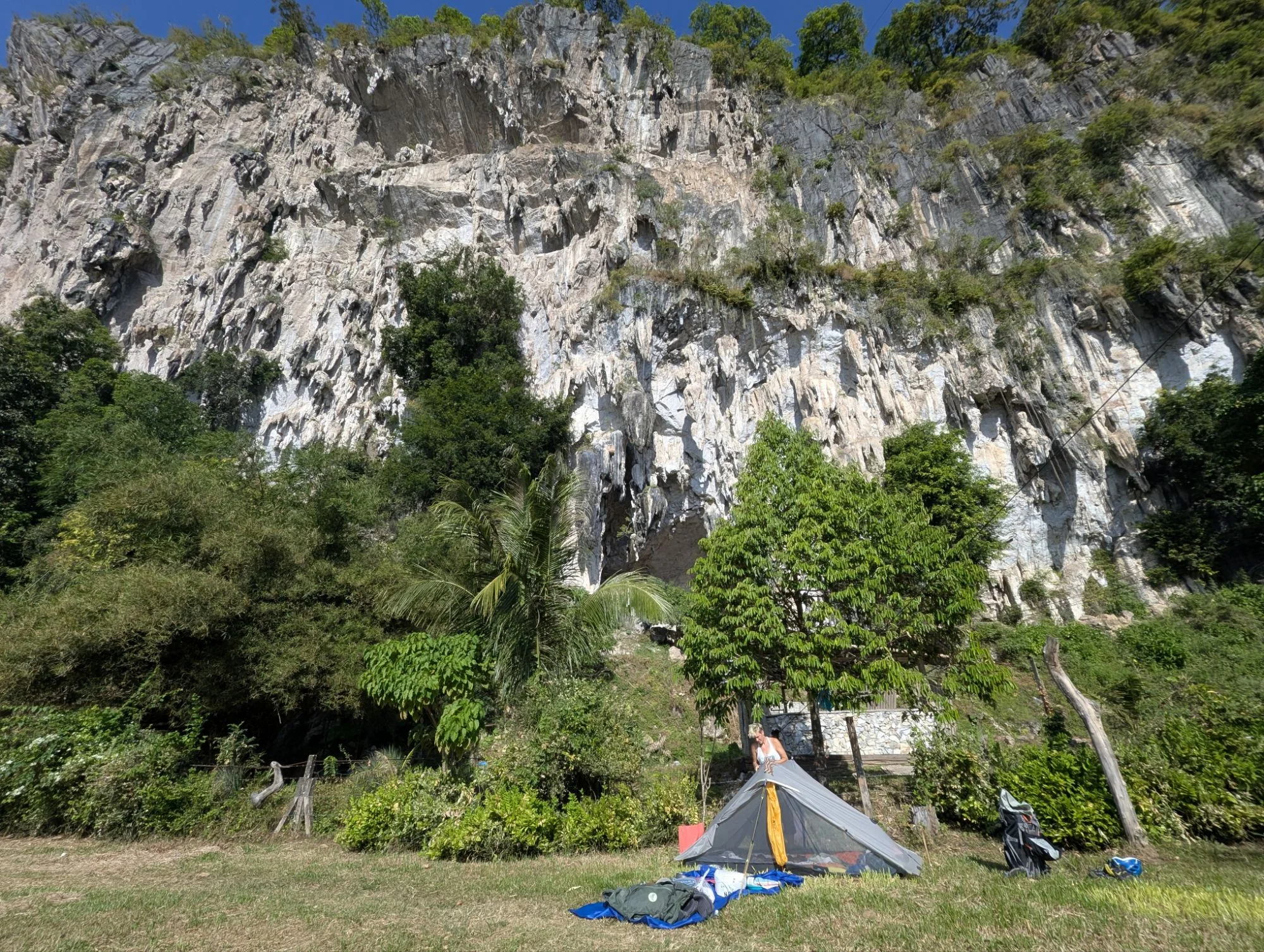 We went to Baling to try the next climbing area called Lubuk Pedati (see it on thecrag.com). After one night at the official camp spot right next to the noisy small road, we moved our tent to the other side of the river, directly in front of the climbing crag. It was a beautiful place and our only neighbor was happy with us camping there.